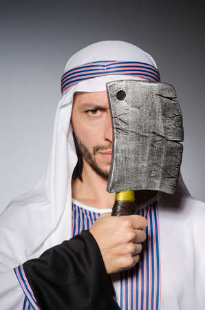 Arab man with sharp axeの写真素材