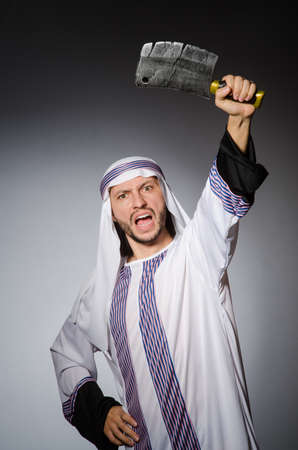 Arab man with sharp axeの写真素材
