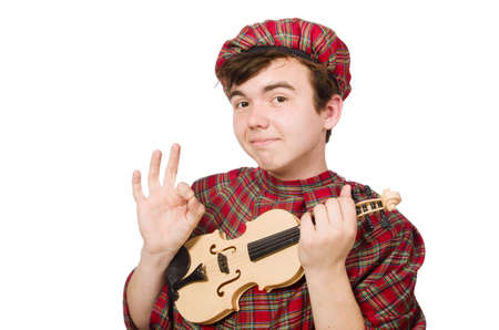 Funny scotsman with violin on whiteの写真素材