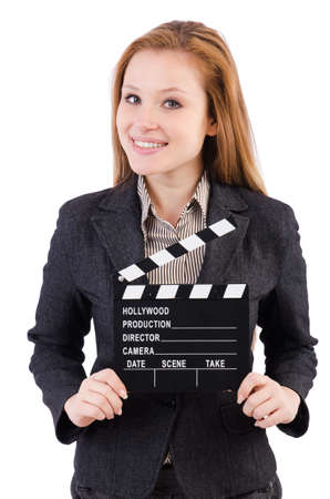 Woman with movie board isolated on whiteの写真素材