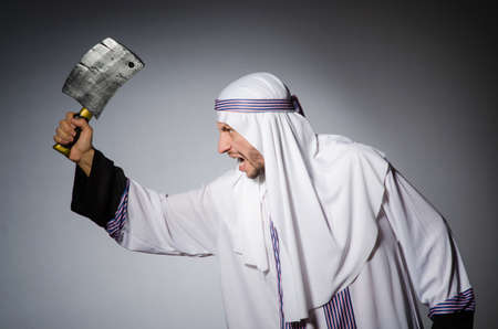 Arab man with sharp axeの写真素材