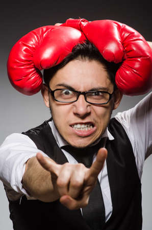 Funny boxer businessman in sport conceptの写真素材