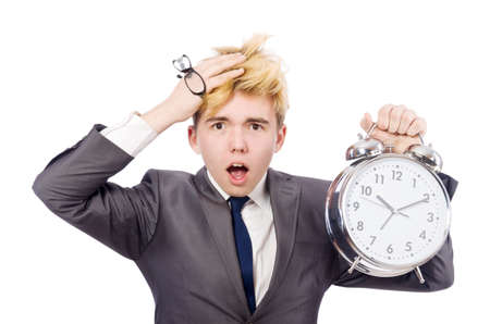 Businessman with clock isolated on whiteの写真素材