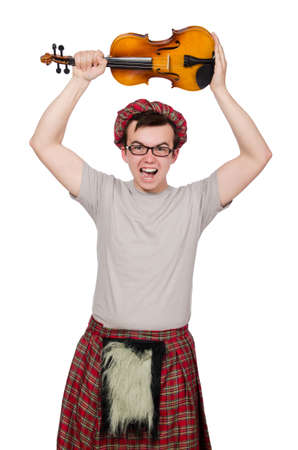 Funny scotsman with violin on whiteの写真素材