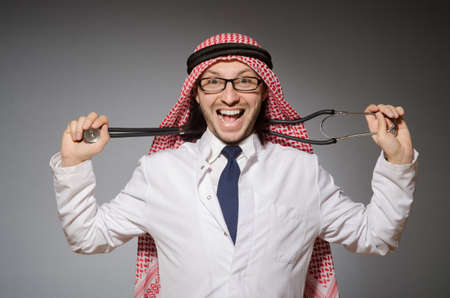 Funny arab doctor with stethoscopeの写真素材