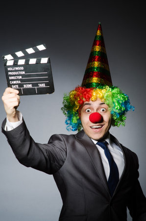Clown with the movie boardの写真素材