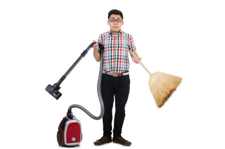 Man with vacuum cleaner and broom on whiteの写真素材
