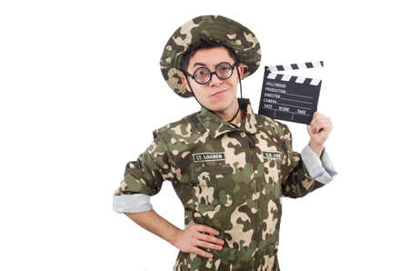 Funny soldier with movie board isolated on the whiteの写真素材