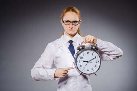 Woman doctor missing her deadlinesの写真素材