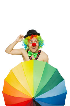 Clown with umbrella isolated on whiteの写真素材