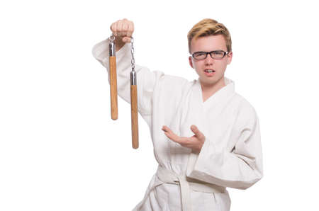 Funny karate fighter with nunchucks on whiteの写真素材