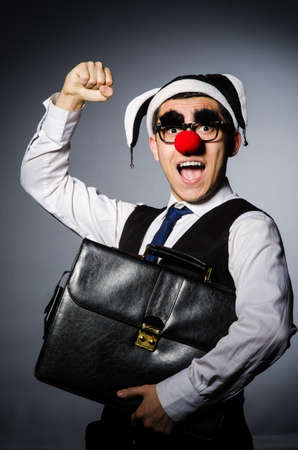 Clown businessman in funny conceptの写真素材