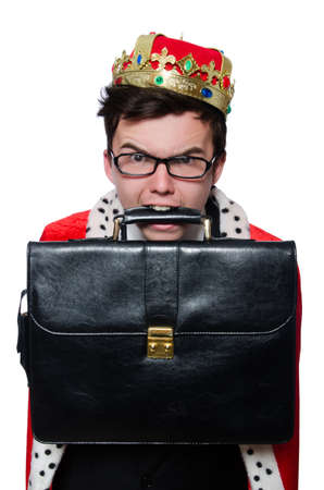 Businessman with crown isolated on whiteの写真素材