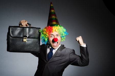 Clown businessman in funny conceptの写真素材