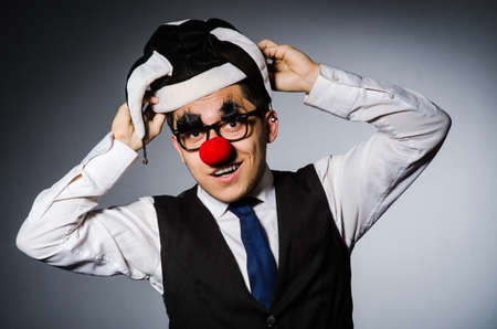 Clown businessman in funny concept