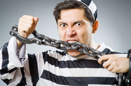 Funny prison inmate in conceptの写真素材