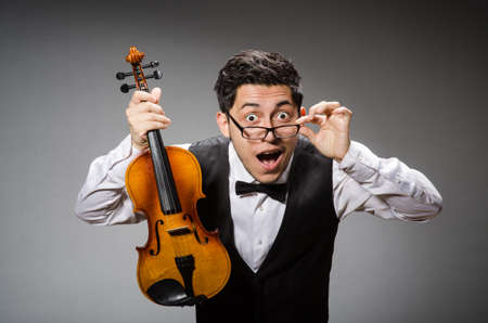 Funny violin player with fiddleの写真素材