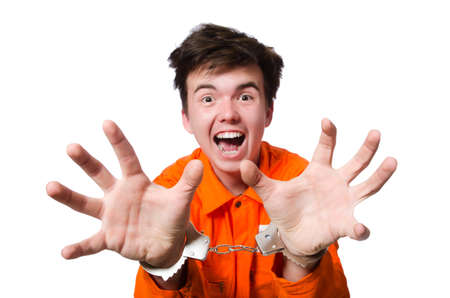 Funny prison inmate with handcuffsの写真素材