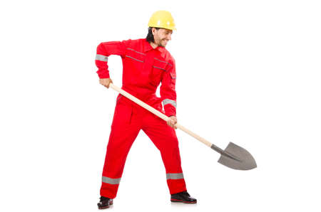Man in red coveralls with spadeの写真素材