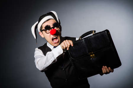 Clown businessman in funny conceptの写真素材