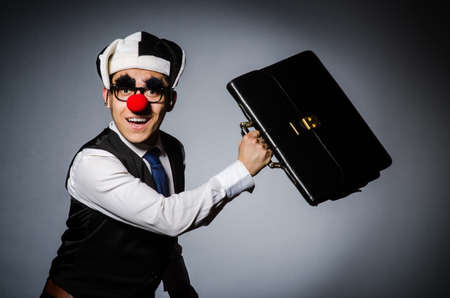 Clown businessman in funny concept