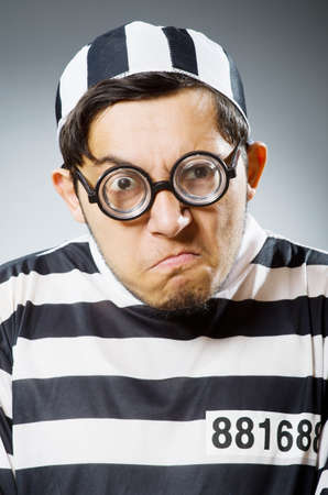 Funny prison inmate in conceptの写真素材
