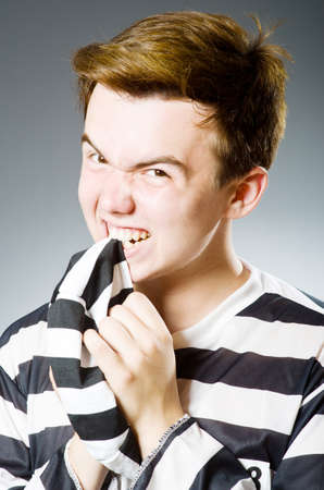 Funny prison inmate in conceptの写真素材