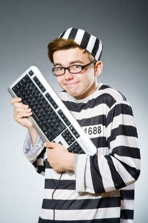 Funny prison inmate in conceptの写真素材