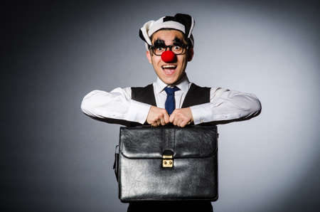 Clown businessman in funny conceptの写真素材