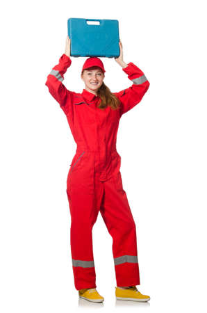 Woman construction worker in red coveralls on whiteの写真素材