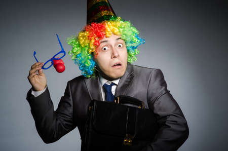 Clown businessman in funny conceptの写真素材