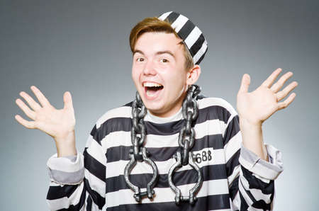 Funny prison inmate in conceptの写真素材