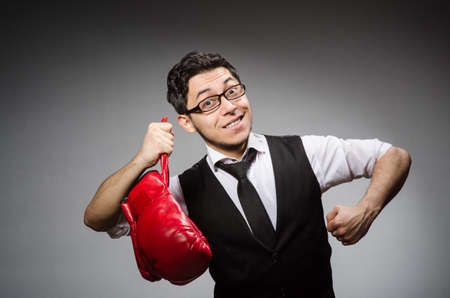 Funny boxer businessman in sport conceptの写真素材