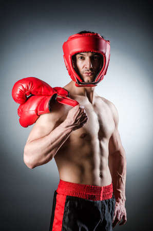 Muscular boxer wiith red glovesの写真素材