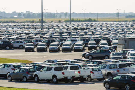 TUSCANY, ITALY - 27 June: New cars parked at distribution center in Tuscany, Italy. This one of...