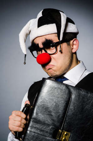 Clown businessman in funny conceptの写真素材