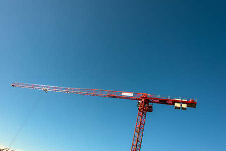 Construction crane on bright summer dayの写真素材