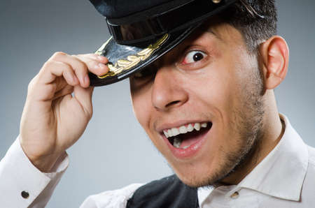 Funny taxi driver wearing peaked capの写真素材