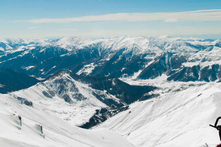 Snow mountains on bright winter day