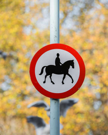 Road sign with horse patrol iconの写真素材