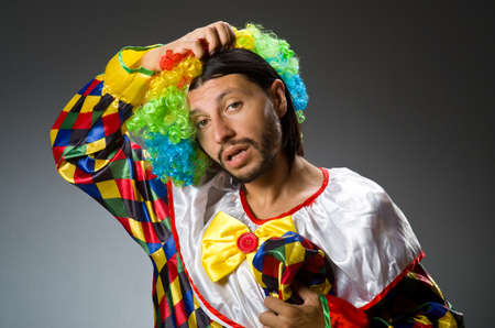 Funny clown in colourful costumeの写真素材
