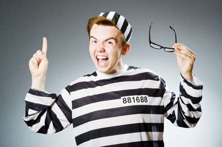 Funny prison inmate in conceptの写真素材