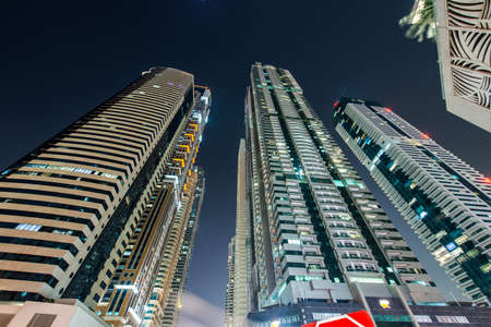 Dubai marina skyscrapers during night hoursのeditorial素材