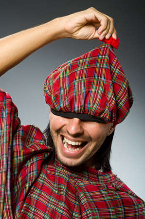Funny scotsman in traditional clothingの写真素材