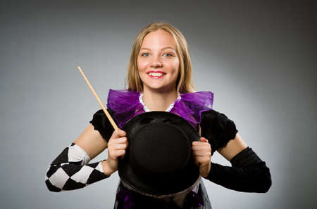 Woman magician doing her tricks with wandの写真素材