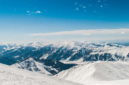 Snow mountains on bright winter day