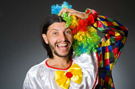 Funny clown in colourful costumeの写真素材