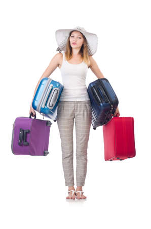 Woman traveller with suitcase isolated on whiteの写真素材