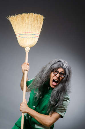 Funny man with brush and wigの写真素材