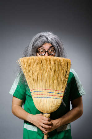 Funny man with brush and wig